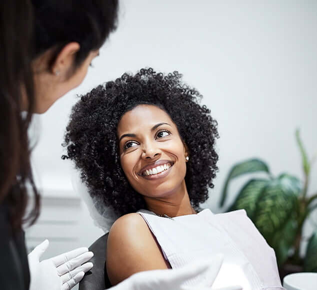 smiling woman at the dentist